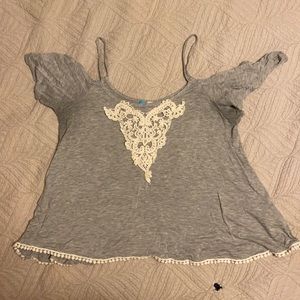 Grey top with cut out sleeve
